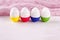 Group of funny colorful eggs - a concept of merry Easter, funny characters, emotions.