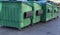 Group of Garbage Dumpsters. Photo image