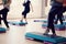 Group of girls is engaged in a step on the stand - fitness.