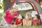 Group Of Girls With Mother Having Fun In Tent In Countryside