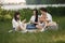 Group of girls play cards in a park