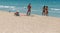 A group of girls sunbathe in El Arenal beach in Mallorca