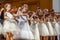 Group of girls violinists on stage.