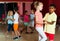 Group of glad kids dancing salsa dance