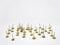 Group of gold metal thumb tack on isolated white background