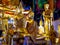 Group of gold painted Buddha statues In Thailand.