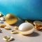 a group of gold and white seashells on a blue background