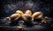 a group of golden eggs sitting on top of a black tablecloth covered in gold foiled eggs and confetti on top of a black table