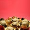 Group of golden ingots on red tray at red background.Chinese new