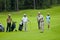 Group golfers on golf feeld