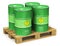 Group of green biofuel drums on shipping pallet isolated on whit