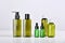 Group of green cosmetic bottle container on white background, Blank label for skincare