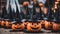 a group of halloween pumpkins with witches hats on them