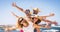 Group of happy adult friends enjoy and celebrate together the summer holiday vacation travel leisure acitivity - men and women
