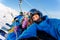 Group of happy friends snowboarding doing selfie