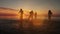 Group of happy girls running and playing in water at the beach on sunset. Beauty and joyful teenager friends having fun