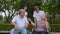 Group of happy grandparents and grandchild talking and laugh together, grandparent sitting on wheelchair. Retirement lifestyle