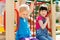 Group of happy little girls on children playground