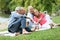 Group of happy seniors having pic-nic taking selfie souvenir