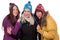 Group of happy women in winter with gloves, scarf and caps