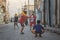 Group of happy, young children playing in the street in a vibrant Cuban neighborhood