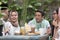 Group of happy young muslim having dinner outdoor during ramadan