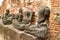 Group of Headless Buddha Images Ruins in Wat Mahathat Ancient Temple, Ayutthaya, Thailand
