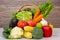 Group Healthy assorted fresh vegetable in a wooden basket