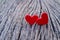 Group hearts placed on the wooden floor and have copy space for design in your work. Red hearts convey the day of love