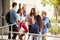 Group Of High School Students Standing Outside Building