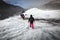 Group of hiker walk on glacier during heavy snow fall on Solheimajokull,