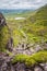 Group of hikers climbing Devils Ladder to reach Carrauntoohil mountain