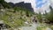 Group of hikers at hiking expedition in Alps