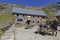 A group of hikers rest for a while at the mountain refuge