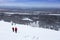 Group of hikers in snowy winter mountains