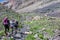 Group of Hikers Walking on Trail Backs