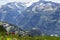 Group of hiking people taking rest  on the top of mountain