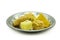 Group of Indian assorted sweets on a plate isolated on the white background