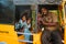 Group of indian schoolgirls smiling to camera in tuk tuk rickshaw, 23 february 2018 Madurai, India