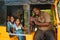 Group of indian schoolgirls smiling to camera in tuk tuk rickshaw, 23 february 2018 Madurai, India