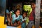 Group of indian schoolgirls smiling to camera in tuk tuk rickshaw, 23 february 2018 Madurai, India