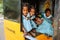 Group of indian schoolgirls smiling to camera in tuk tuk rickshaw, 23 february 2018 Madurai, India