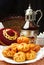 Group of individual pies with meat and potato - vak balish. Tatar traditional pies. Wooden background. Top view