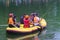 a group of Indonesian search and rescue army (Tim SAR) with life vests on an inflatable boat is searching for a body