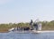 Group of international tourists leaving from the airboat pier.