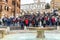 Group of Italian kids visiting the Spanish steps in Rome in a school trip