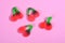 Group of jelly candies cherries on pink background