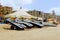 A group of jet skis on a sandy beach opposite the water sports center in Alanya Turkey