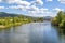 A group of kayakers enjoy a beautiful summer day on Sand Creek River and Lake Pend Oreille in the downtown area of Sandpoint, Idah