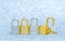 Group of keyed padlocks on glittering background